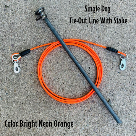 A single dog tie-out line with a stake, featuring a bright neon orange colored cable and a metal stake with a spring snap on one end. The image is labeled with the product name and the color of the cable.