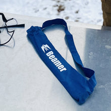 Load image into Gallery viewer, Beamer Antenna bag, royal blue in color on a metal table. The word Beamer is printed on bag. Bag has a carrying strap. 